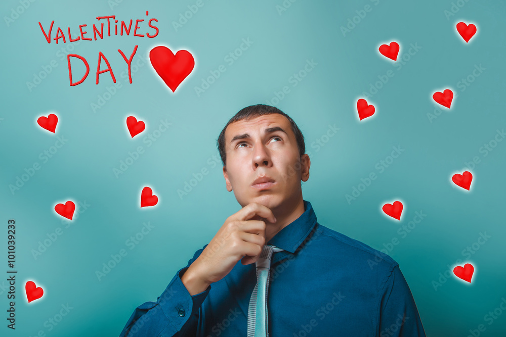 Male looking up thinking the businessman Valentine's Day celebra Male looking up thinking the businessman Valentine's Day celebra