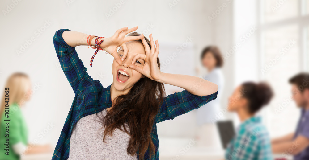 happy student girl making face at school happy student girl making face at school