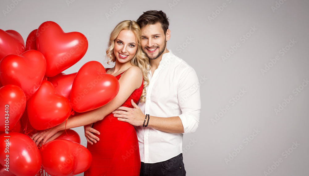 Portrait of loving couple with ballons. Valentine's photo Portrait of loving couple with ballons. Valentine's photo