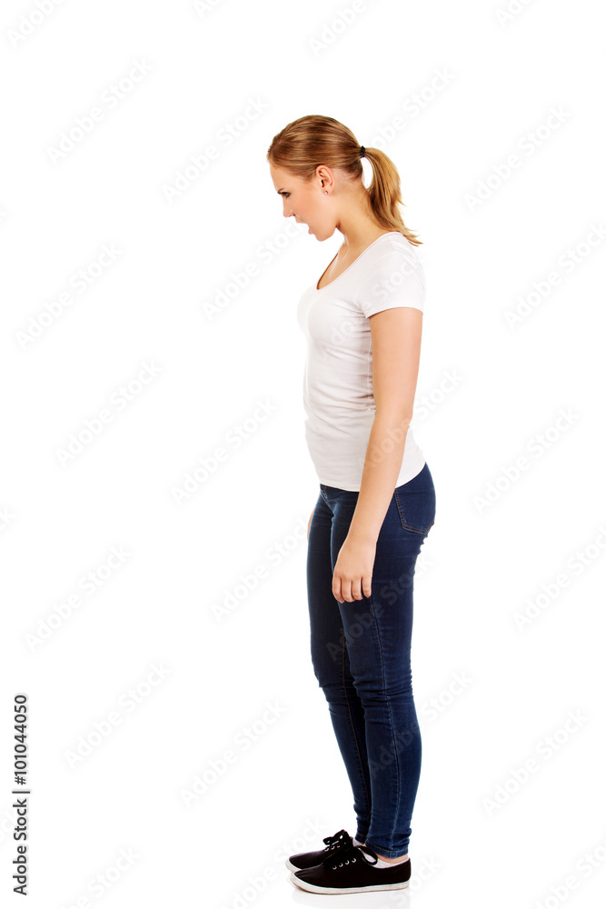Angry young woman screaming for someone Angry young woman screaming for someone