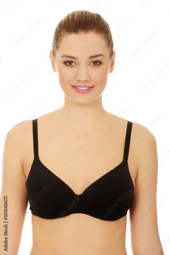Obraz premium Young woman in black bra