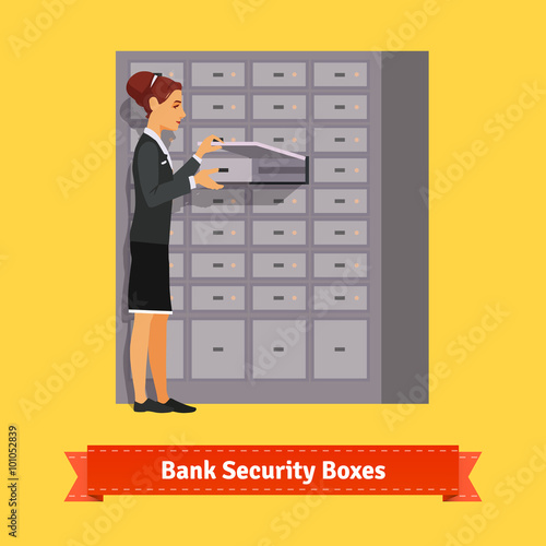 Bank clerk woman opening safe-deposit box