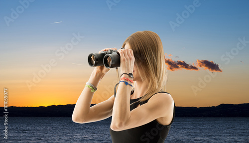 young woman with binoculars
