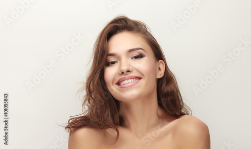 Fényképezés Young laughing adorable brunette woman with trendy makeup and bare shoulders aga