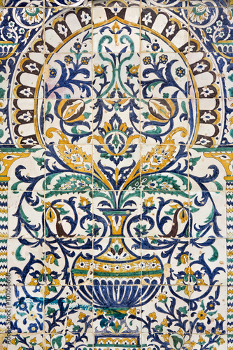 Tunisia. Kairouan - the Zaouia of Sidi Saheb. Fragment of ceramic tiled panel with floral and architectural motifs