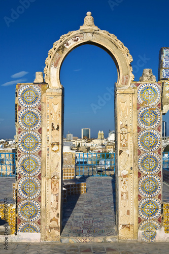 Tunisia. Tunis - old town (medina) seen from roof top. Ornamental gate covered tiles with geometric shape motifs