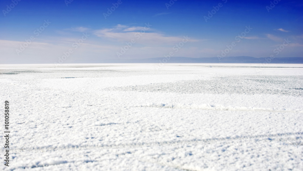 Lake landscapes with snow on the ice