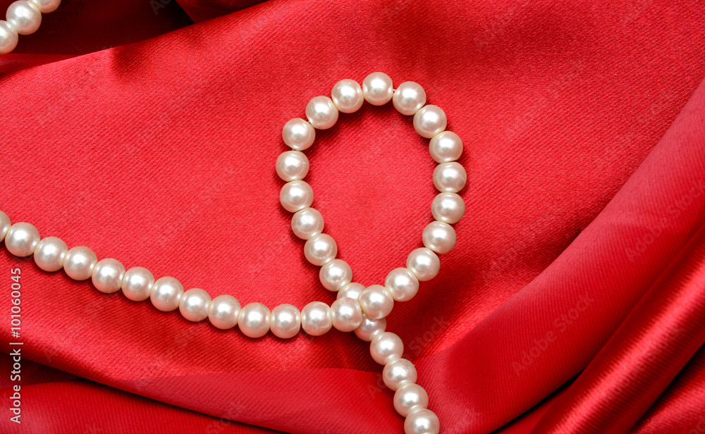 silver pearl on Red Silk cloth