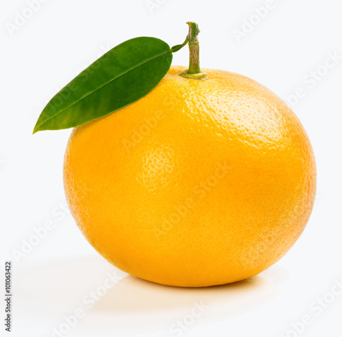 Yellow grapefruit with leaf