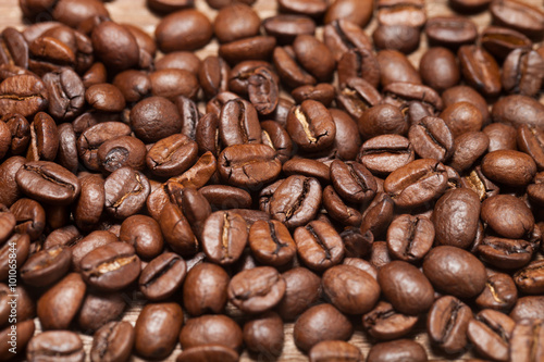 Coffee beans texture for background. Selective focus