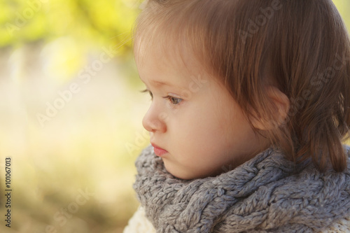 Toddler playing in garden