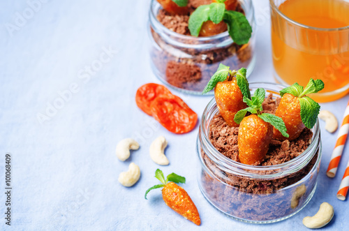 chocolate biscuit in a jar and dried apricots cashew candies in