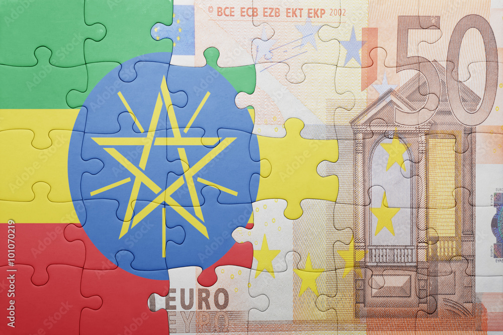 Fototapeta premium puzzle with the national flag of ethiopia and euro banknote