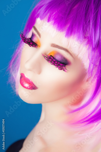 beautiful woman wearing colorful wig