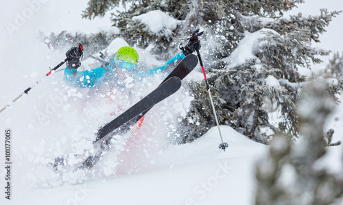 Tableau sur toile Man freerideer running downhill in forest
