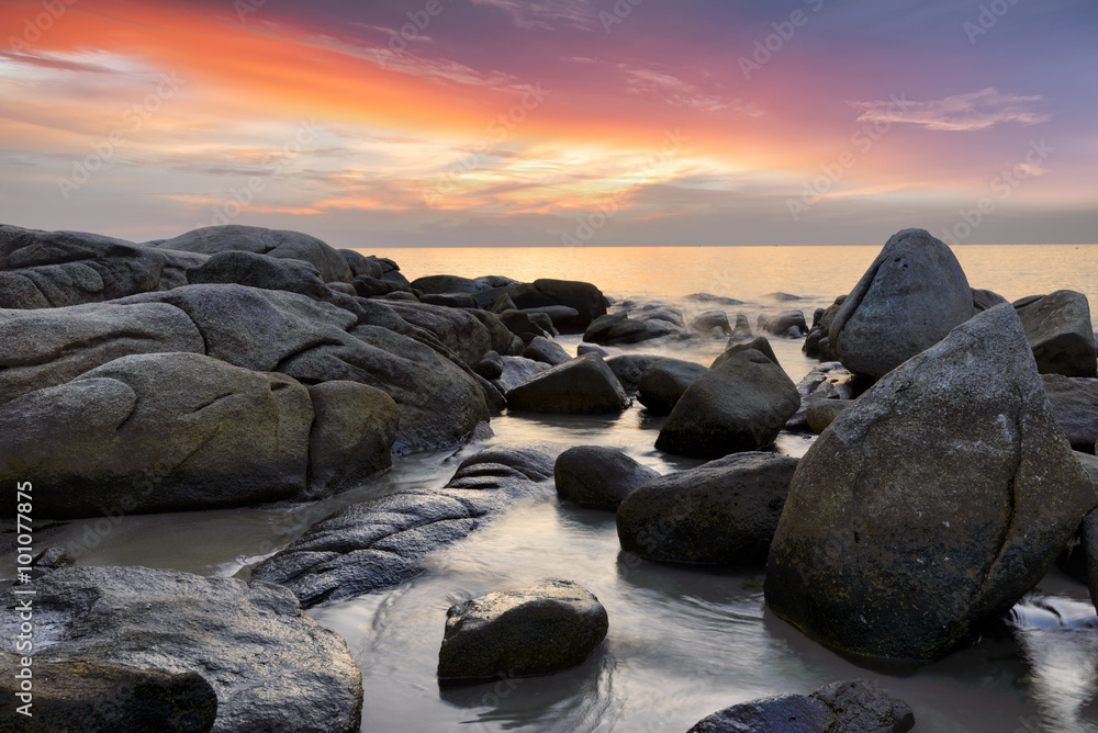 Seascape Thailand, the waves ripple rock and sunrise at the beach beautiful landscape.