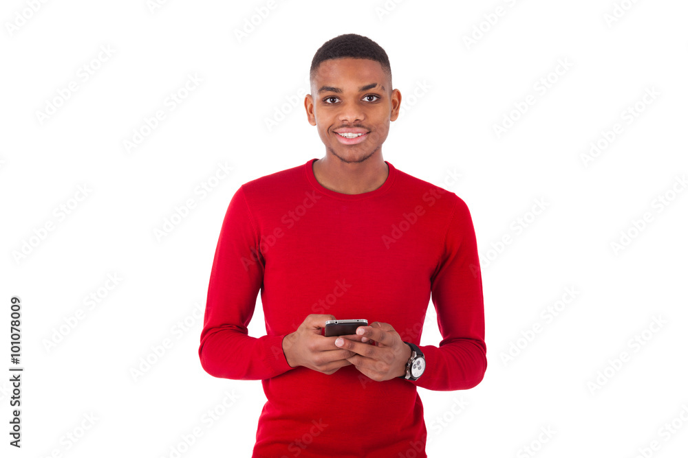 African American young man sending a text message on her smartph African American young man sending a text message on her smartph