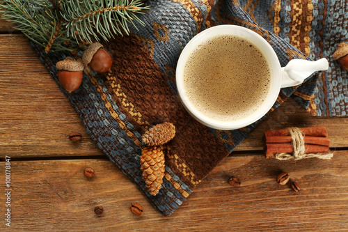 Cup of coffee on a napkin, top view