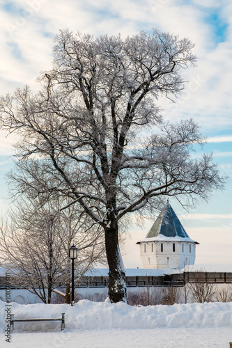 The tower of the monastery, a tree and a bench © phantom1311