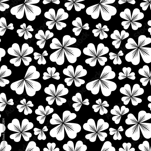 Seamless black and white pattern with shamrock silhouette