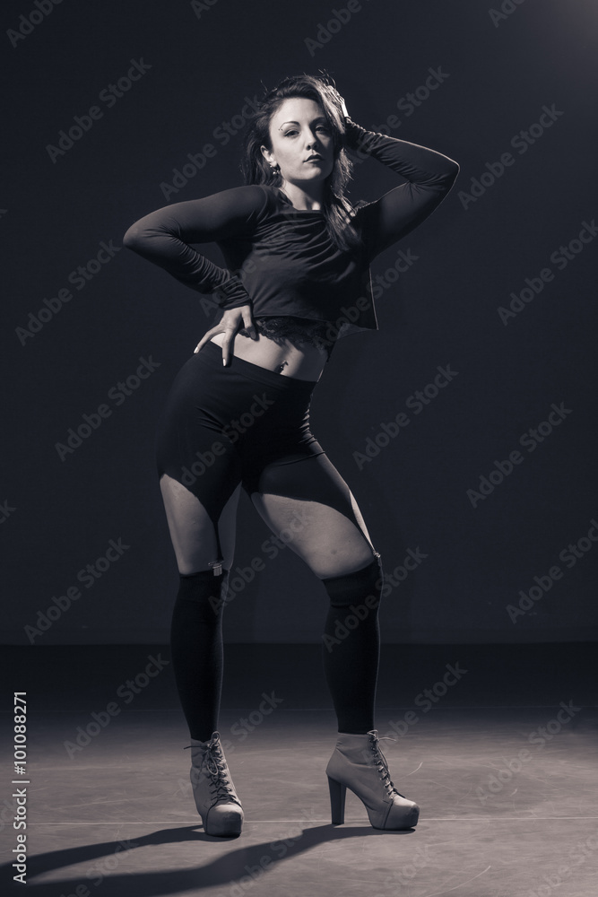 One girl posing in Vouge dance style.