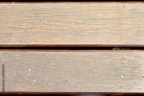 Tiled of brown wood.