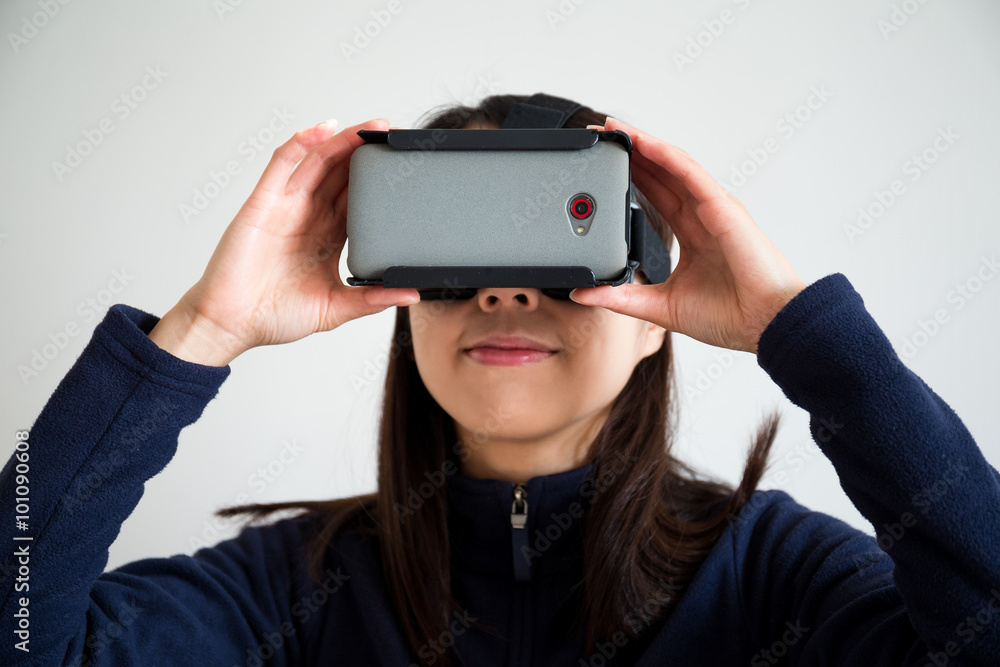 Asian Woman looking though vr