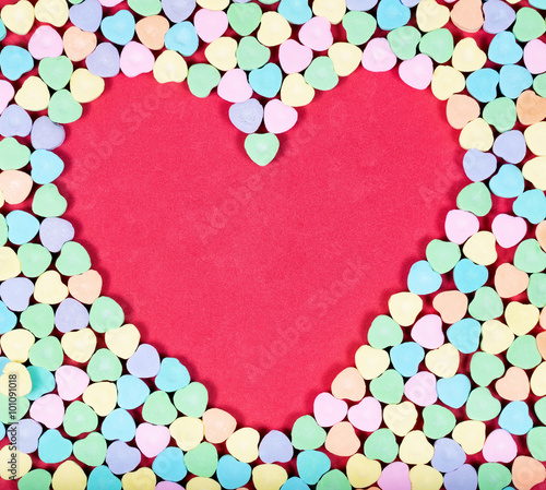 Heart blank space with colorful candies on outside