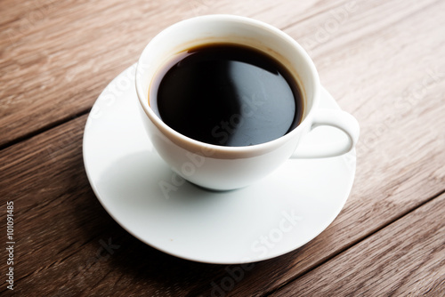 cup coffee on wood background
