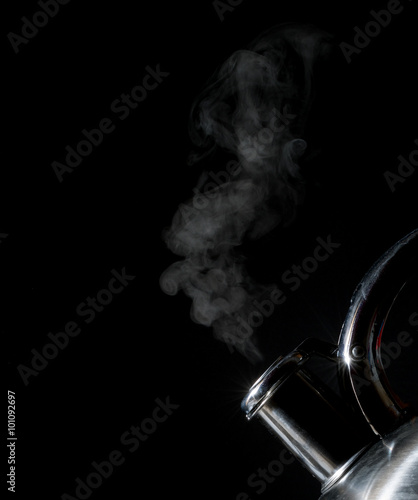 kettle whistling, boiling kettle, steam, isolated on a black background