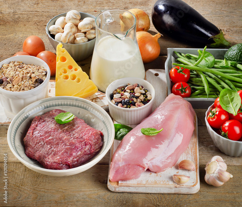 Assortment of Fresh Vegetables and Meats for Healthy Diet on a r photo