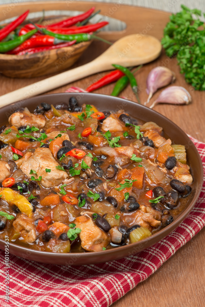stew with black beans, chili, chicken and vegetables