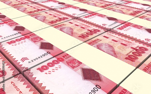 Фотография Tanzanian shilling bills stacks background