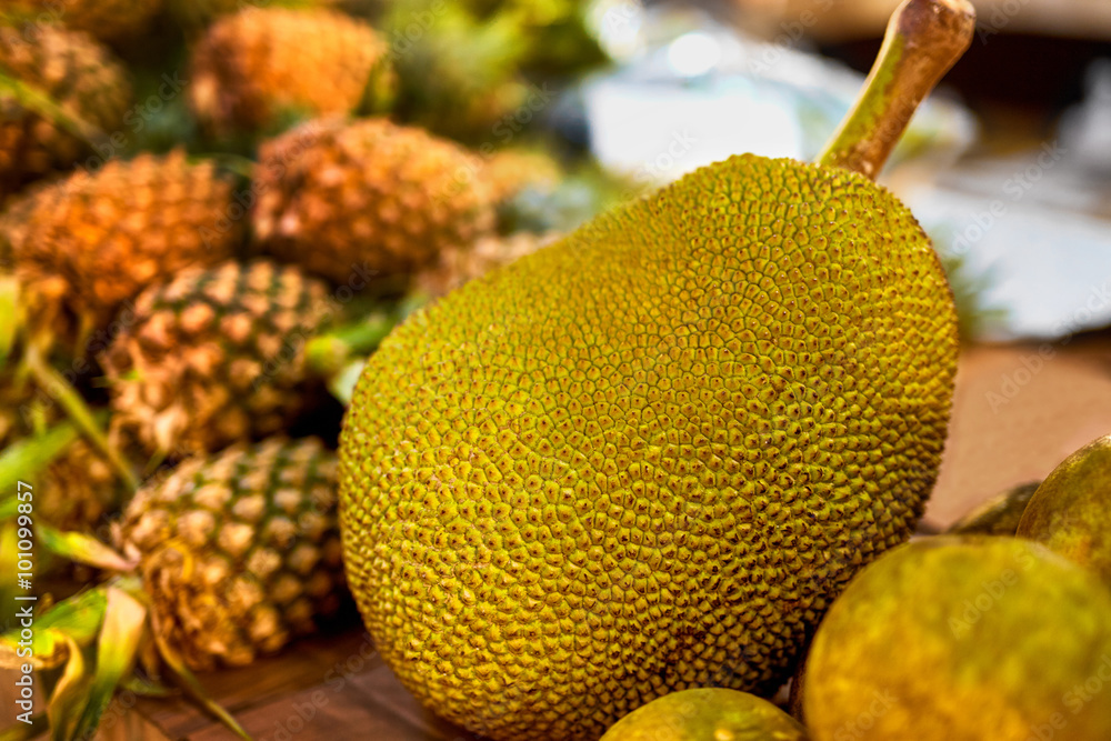Fruits. Healthy Eating. Vegan Raw Food. Fresh Organic Ripe Jackfruit ( Jack Fruit ) At Street Farmer Market ( Grocery Store ) In Koh Samui, Thailand, Asia. Background. Nutrition. Vitamins Fruits. Healthy Eating. Vegan Raw Food. Fresh Organic Ripe Jackfruit ( Jack Fruit ) At Street Farmer Market ( Grocery Store ) In Koh Samui, Thailand, Asia. Background. Nutrition. Vitamins