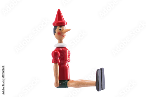 Fotografie, Obraz Pinocchio Toy Statue isolated on white