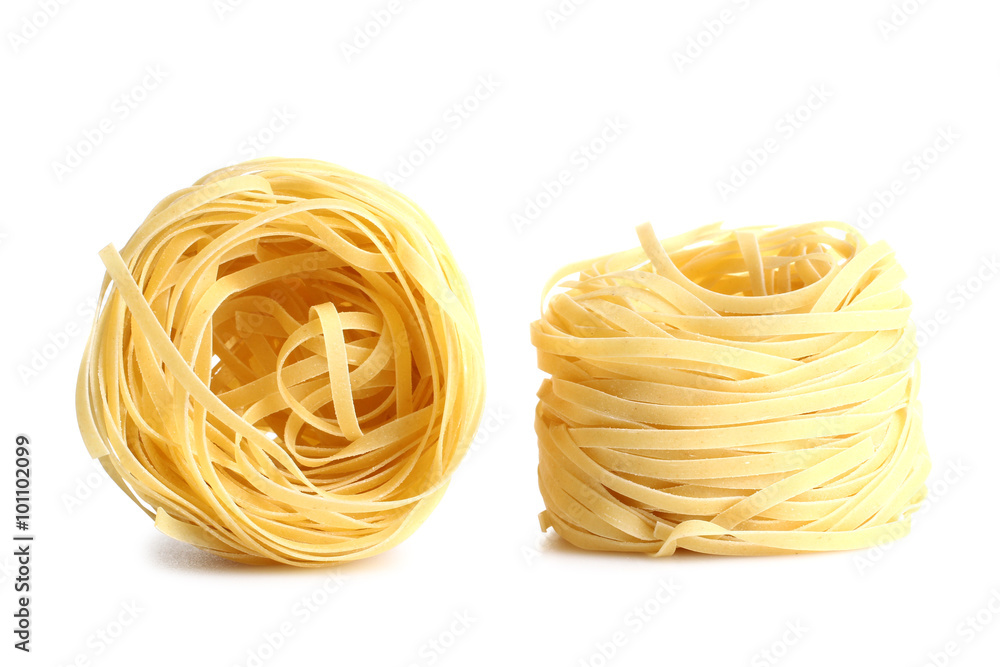 Twisted noodles isolated on white background. Italian food object. Twisted noodles isolated on white background. Italian food object.