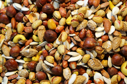 Dried fruit background: nuts, cashews, pistachios and almonds