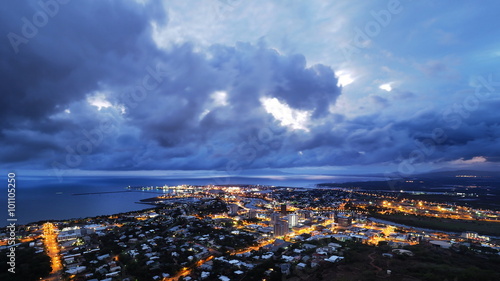 Dark monsoonal clouds hang over the North Queensland port city of Townsville. Queensland, Australia.