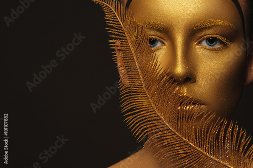 amazing woman with a gold skin