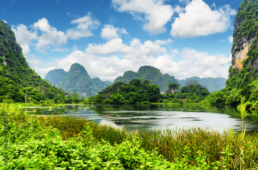 Scenic view of lake among karst towers at Ninh Binh, Vietnam