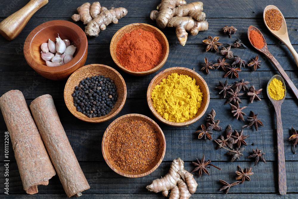 Colorful spice powder, chilli, pepper, turmeric, cashew