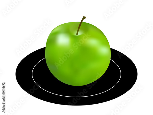 green apple on a plate isolated on white background 