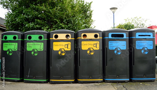 Group of various recycling bins in a row