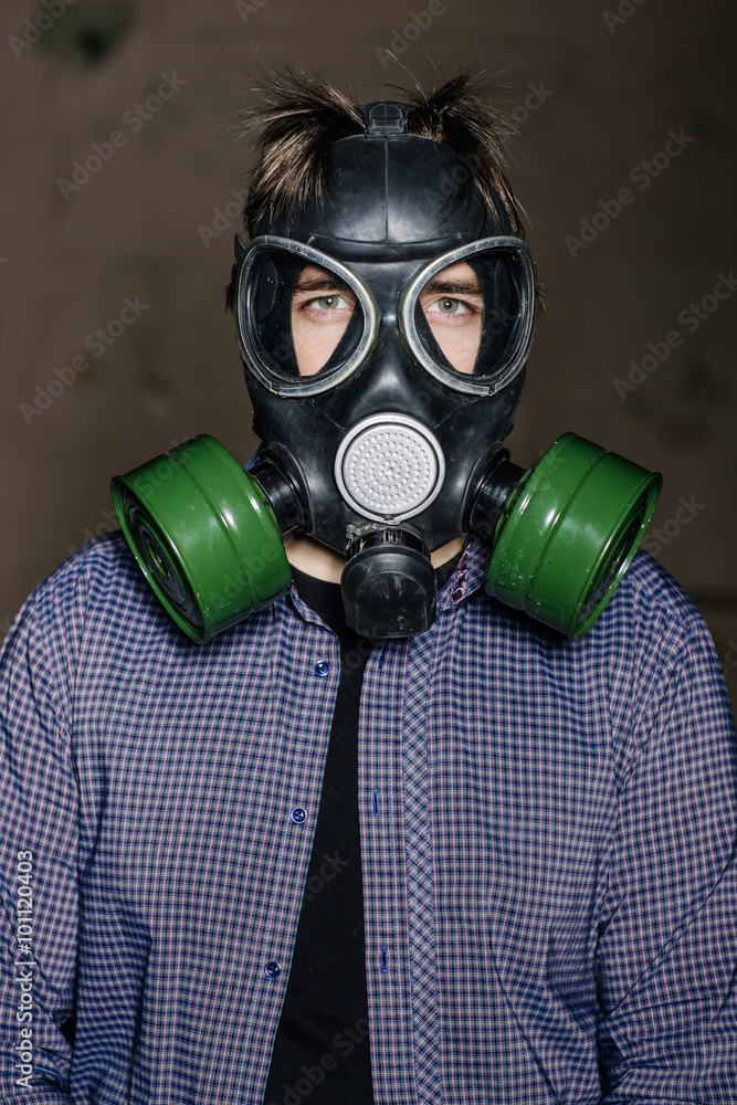 Man with protective gas mask looking at the camera Man with protective gas mask looking at the camera