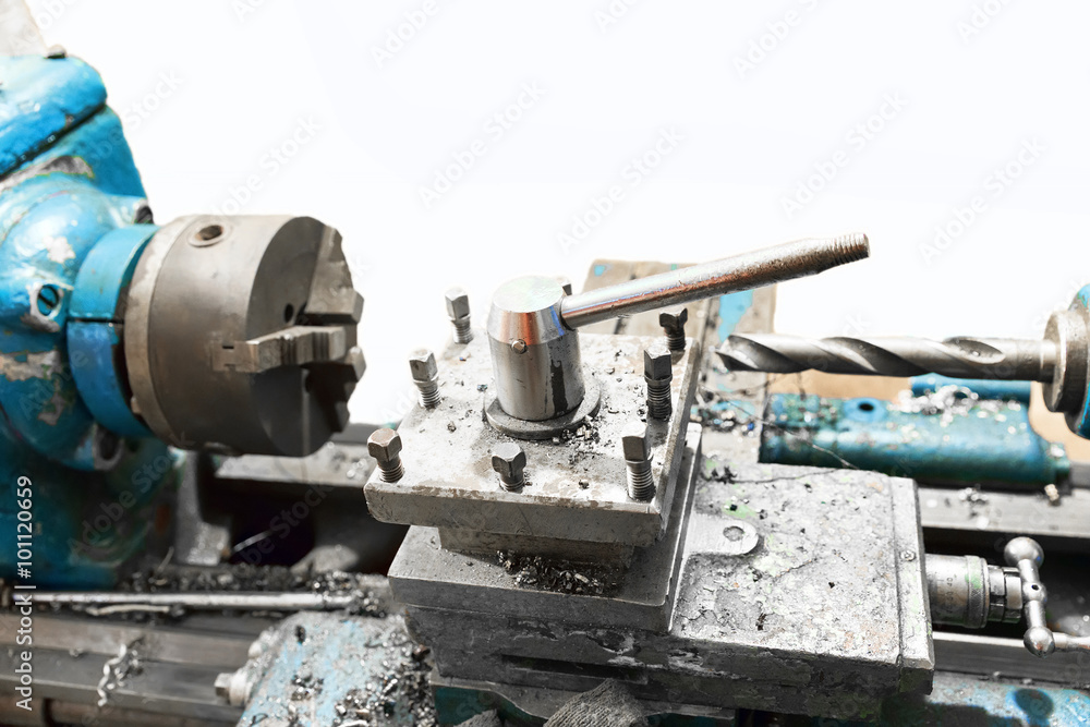 Old lathe on a white background Old lathe on a white background