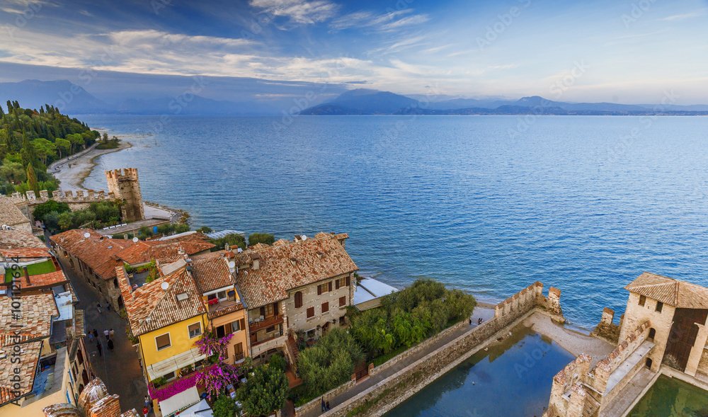 romantic view of the sunset from the Scaliger castle of Sirmione lake garda