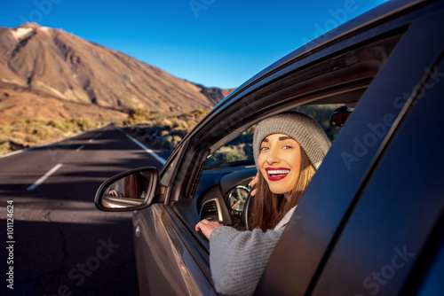 Woman driving mountain road