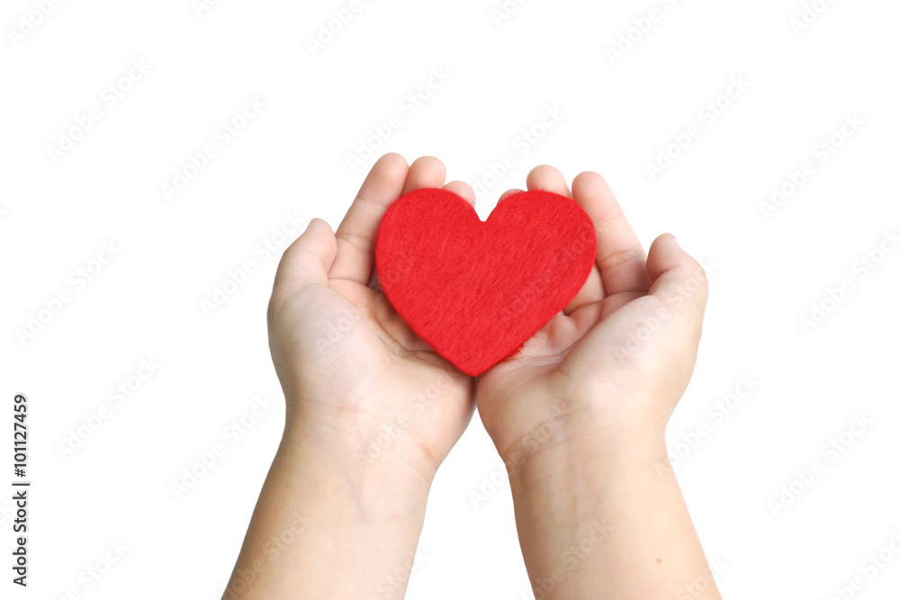 baby's hand holding a red heart baby's hand holding a red heart