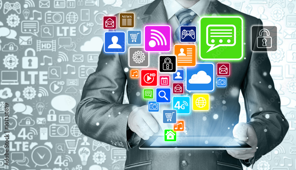 Business man using tablet PC with social media icon set Business man using tablet PC with social media icon set