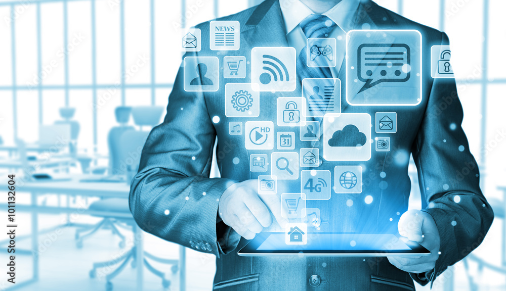 Business man using tablet PC with social media icon set Business man using tablet PC with social media icon set